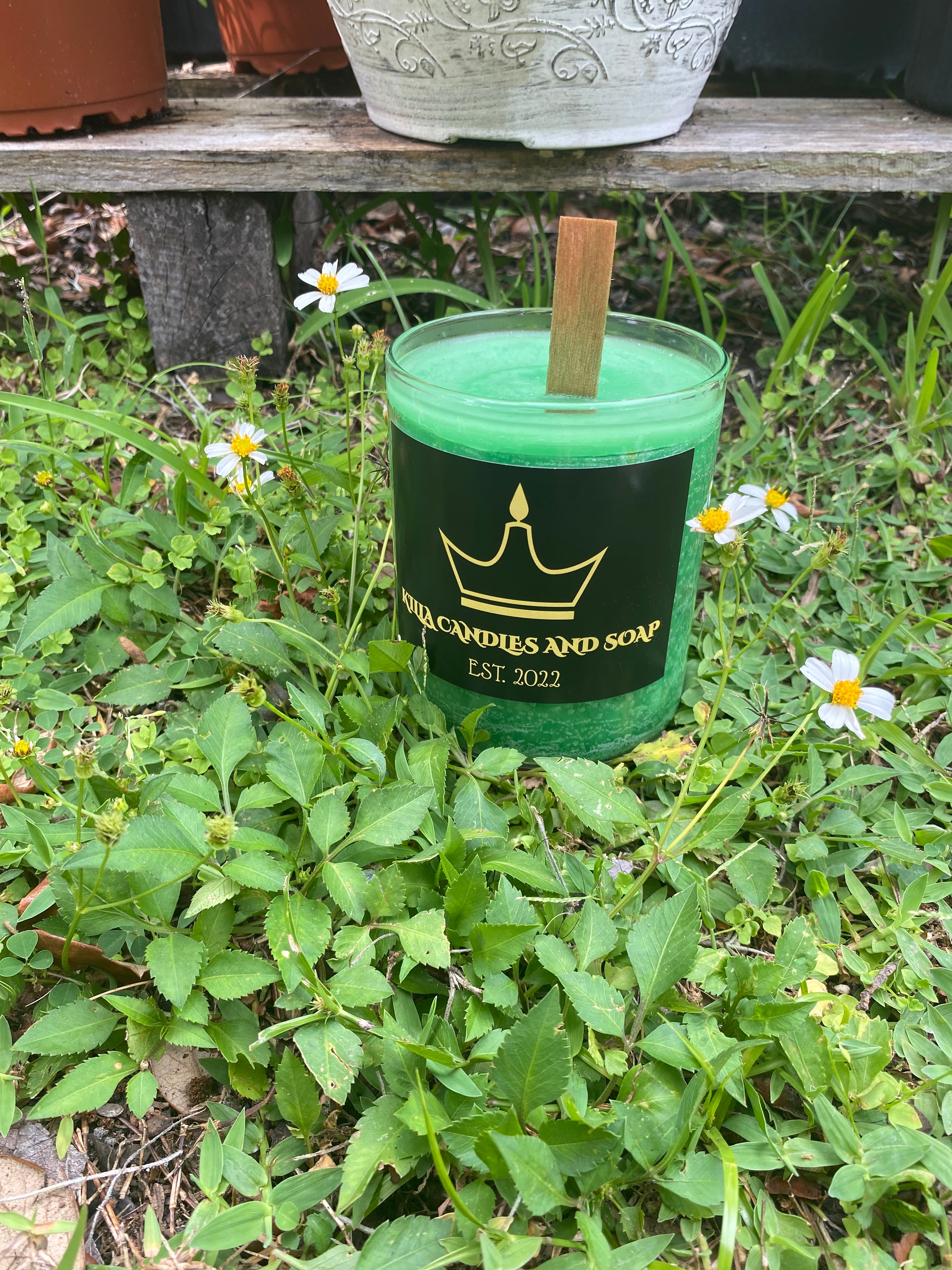Handmade Small Green Colored Candle with Honeysuckle and Mint Scent. Candle is 18.75 oz with Wooden Wick.