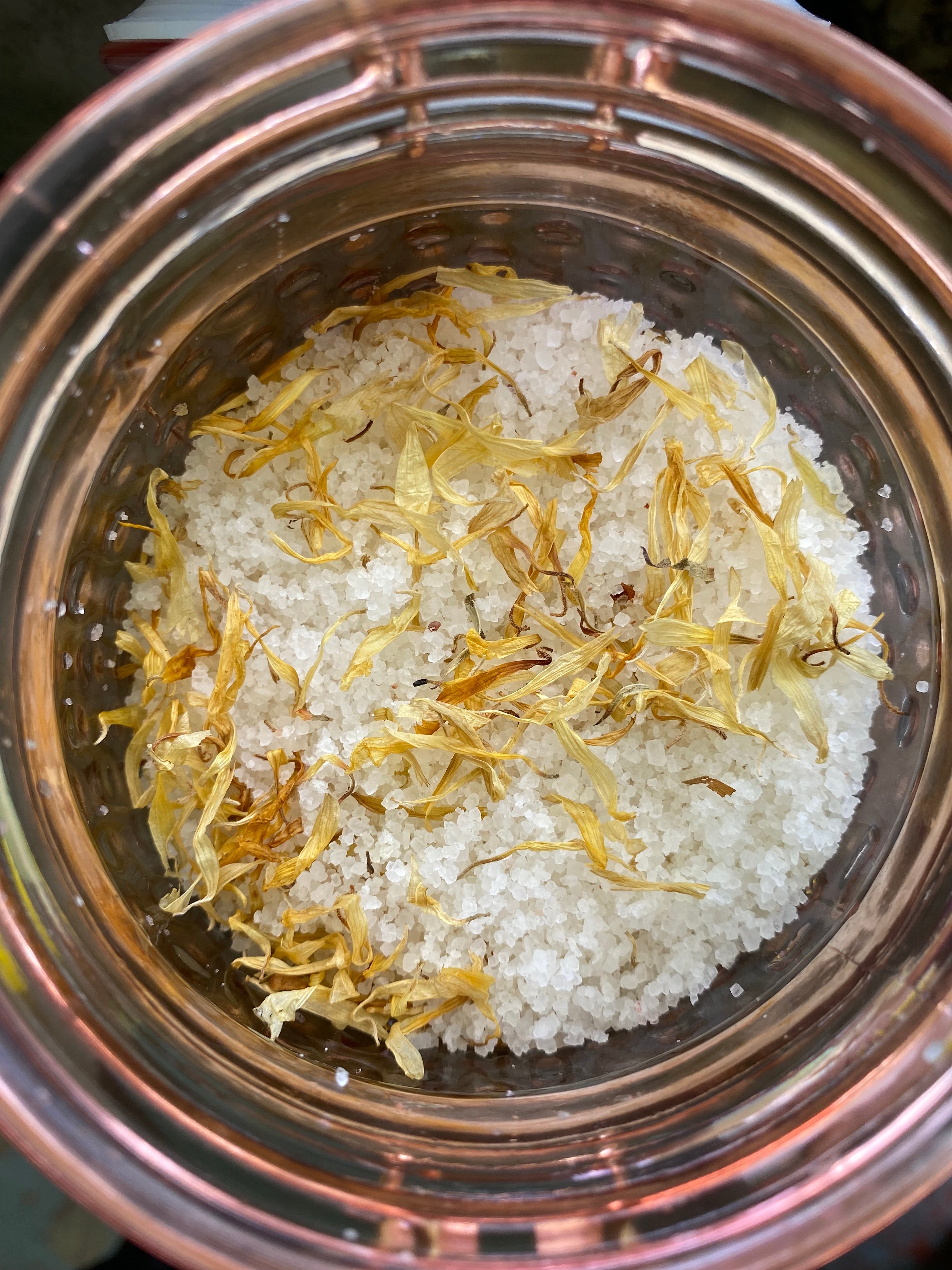 Ancient Pink Himalayan Salt blended with Epsom Salt Olive Jojoba Sunflower Shae Butter Oils with Hints of Clove Lavender Chamomile Tea Tree Tangerine Sweet Orange Geranium Essential Oil Mixed with Lavender Jasmine Rose Buds and Petals Lily's Calendula Albizzide Flowers