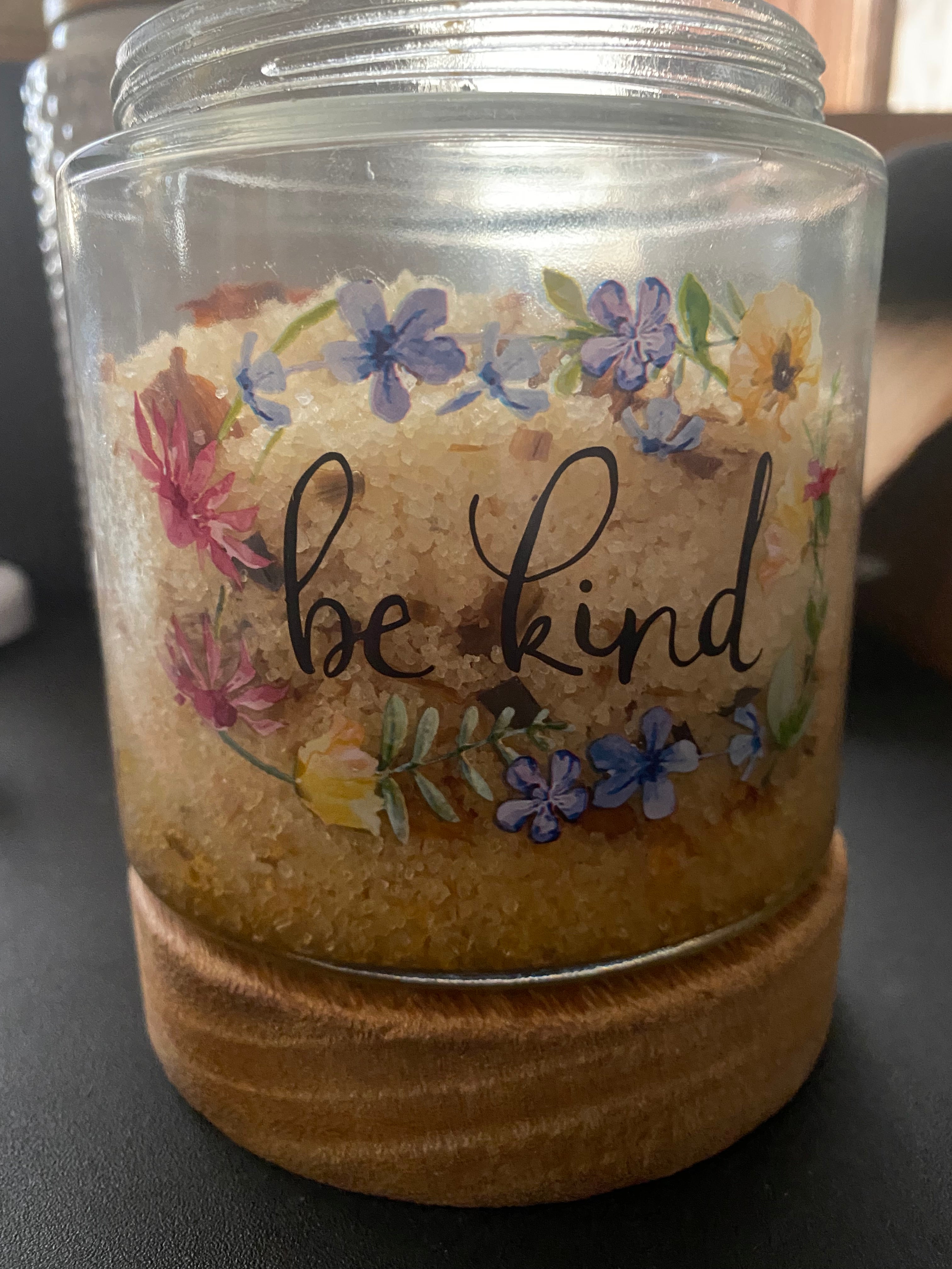 2 Layers of Lily Flowers Blended on Top and Jasmin Flowers on Bottom with Lavender Sweet Orange Geranium Tea Tree Tangerine Essential Oils Jojoba Olive and Shae Butter Oils and Epsom and Dead Sea Salts.