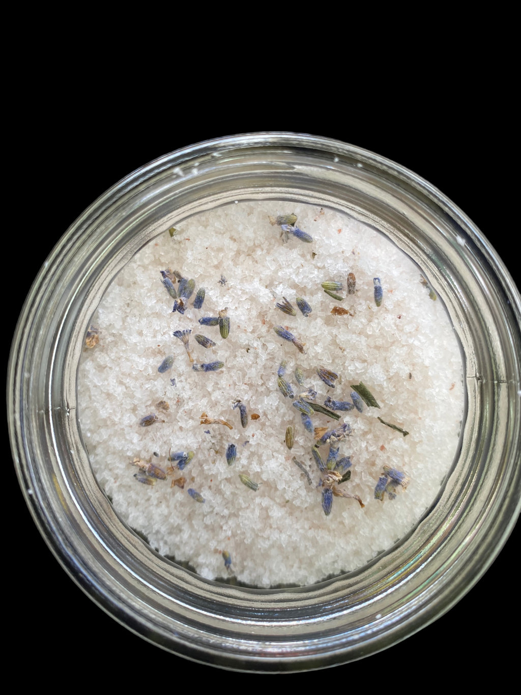 Clear Vintage Mason Jar Filled with Clove Lavender/Chamomile Tea Tree and Geranium Essential Oils has Dead Sea Salt Pink Himalayan Sea Salt has Olive Jojoba Sunflower and Shae Butter Oils. Blended with Lavender Flowers 