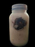 Coconut Jojoba and Olive Oils with Tea Tree and Tangerine Essential Oils with Lemon Slices