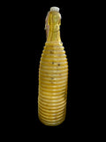 Large Orange Vintage Bottle with Pressure Snap has Bath Salts made with Natural Organic Products such as Epsom Pink Himalayan Sea Salt Baking Soda Shae Butter Jojoba Olive Oils with Lavender Flowers Lavender Sweet Orange Tea Tree Geranium Oil.