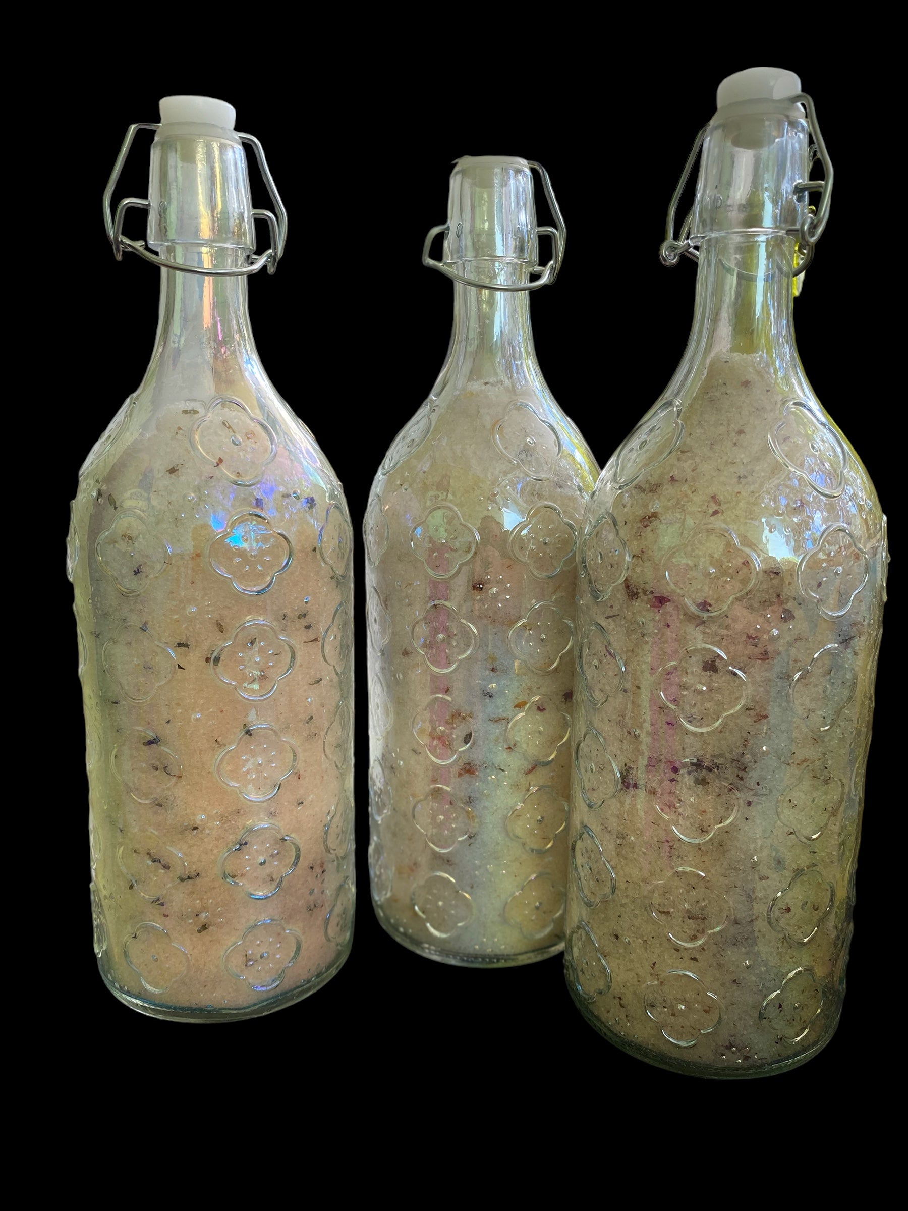 Vintage Tri-color Glass Bottles Filled with Epsom Salt Pink Sea Salt Jojoba Sunflower Olive Shae Butter Oils has Geranium Bergamot Cedarwood Clary Sage and Lavender Essential Oils and has 3 Different Blends Rose Petals Lavender or Calendula/Rose Petals.