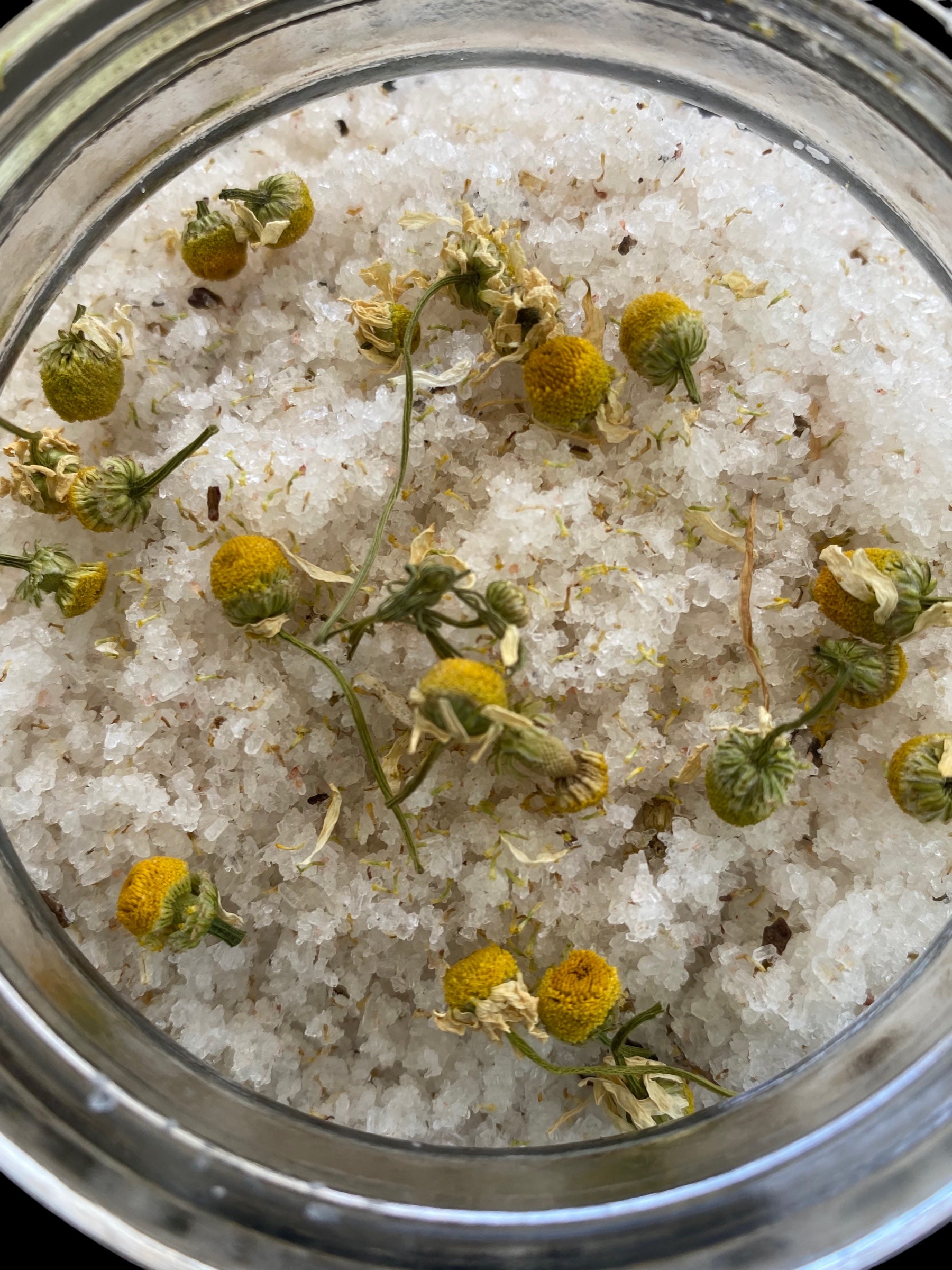 Camomile and Aloe Flowers Shae Butter Jojoba Coconut Olive Oils with Essential Oils of Ruby Red Grapefruit Marjoram Lemon Lime Blood Orange Tangerine Clove Lavender Sweet Orange Geranium and Spearmint Pink Ancient Sea Salt Epsom Salt Citric Acid Baking Soda 