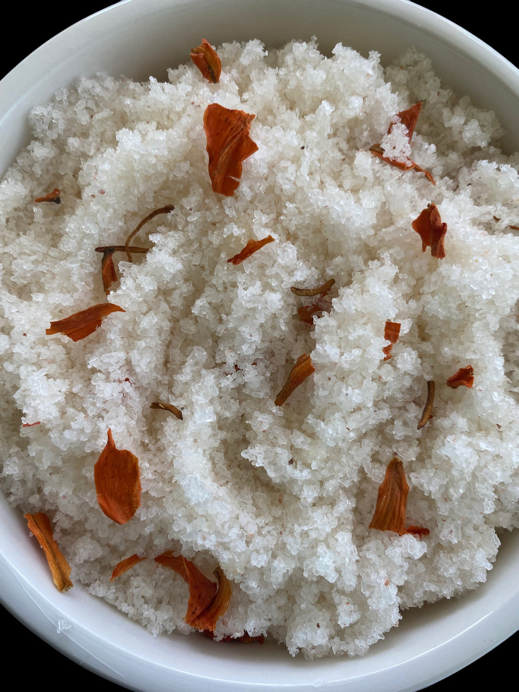 Lily Flowers Shae Butter Jojoba Coconut Olive Oils with Essential Oils of Ruby Red Grapefruit Marjoram Lemon Lime Blood Orange Tangerine Clove Lavender Sweet Orange Geranium and Spearmint Pink Ancient Sea Salt Epsom Salt Citric Acid Baking Soda 